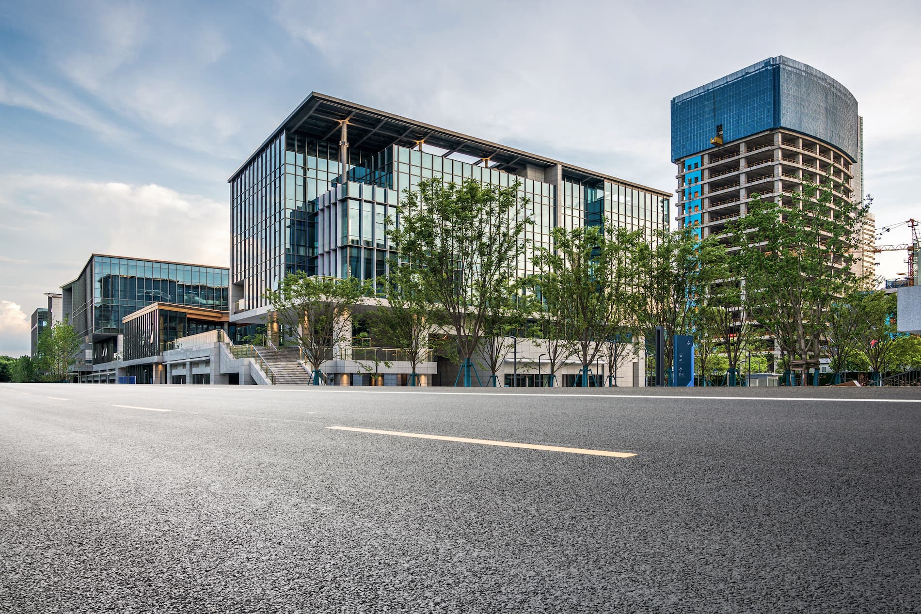 modern-commercial-building-surrounded-by-greenery-urban-landscape (